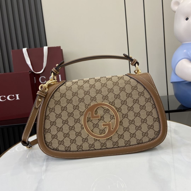G*u*i top handle bags